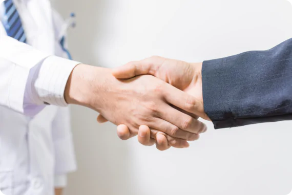 medical director and recruiter or search consultant shake hands medical director and recruiter or search consultant shake hands